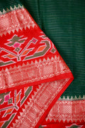 Dupion saree green and red color with allover zari lines, big printed border and zari border, short pallu and pain blouse.