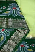 Dupion saree green color with allover zari lines, big printed border and zari border, short pallu and pain blouse.