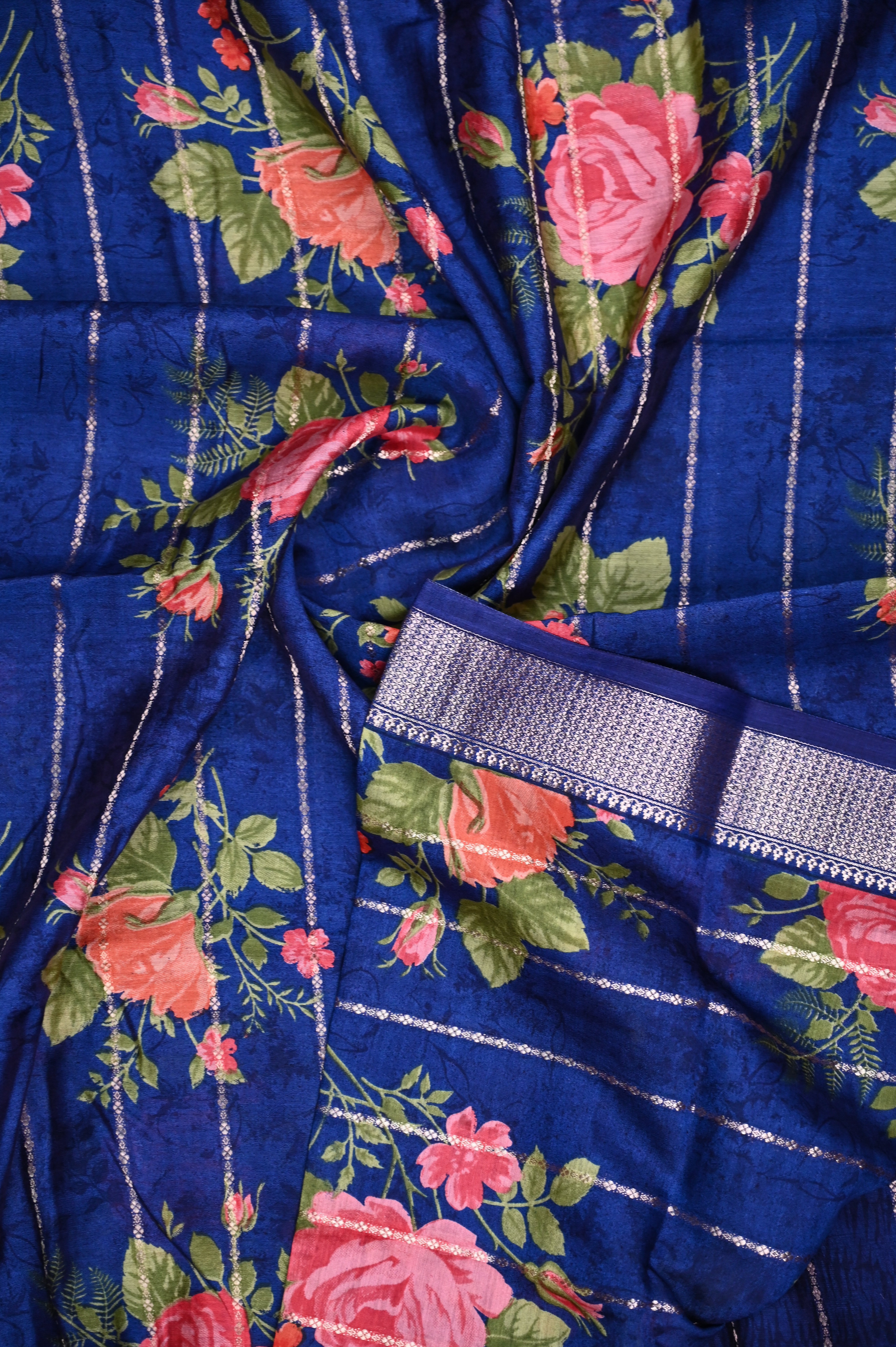 Maheshwari saree blue color with allover digital floral prints with zari lines, short pallu, small zari border and blouse