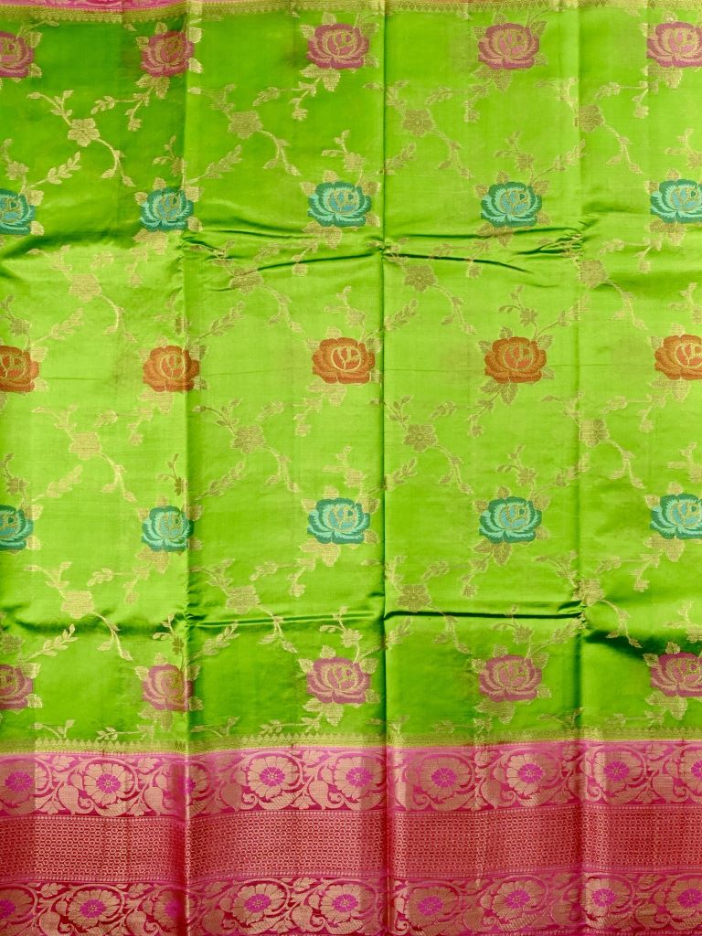 Akshara silk fancy saree parrot green color allover zari weaves & zari border with rich contrast ballu and brocade blouse