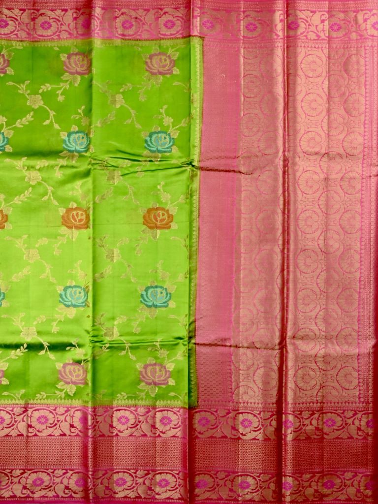 Akshara silk fancy saree parrot green color allover zari weaves & zari border with rich contrast ballu and brocade blouse