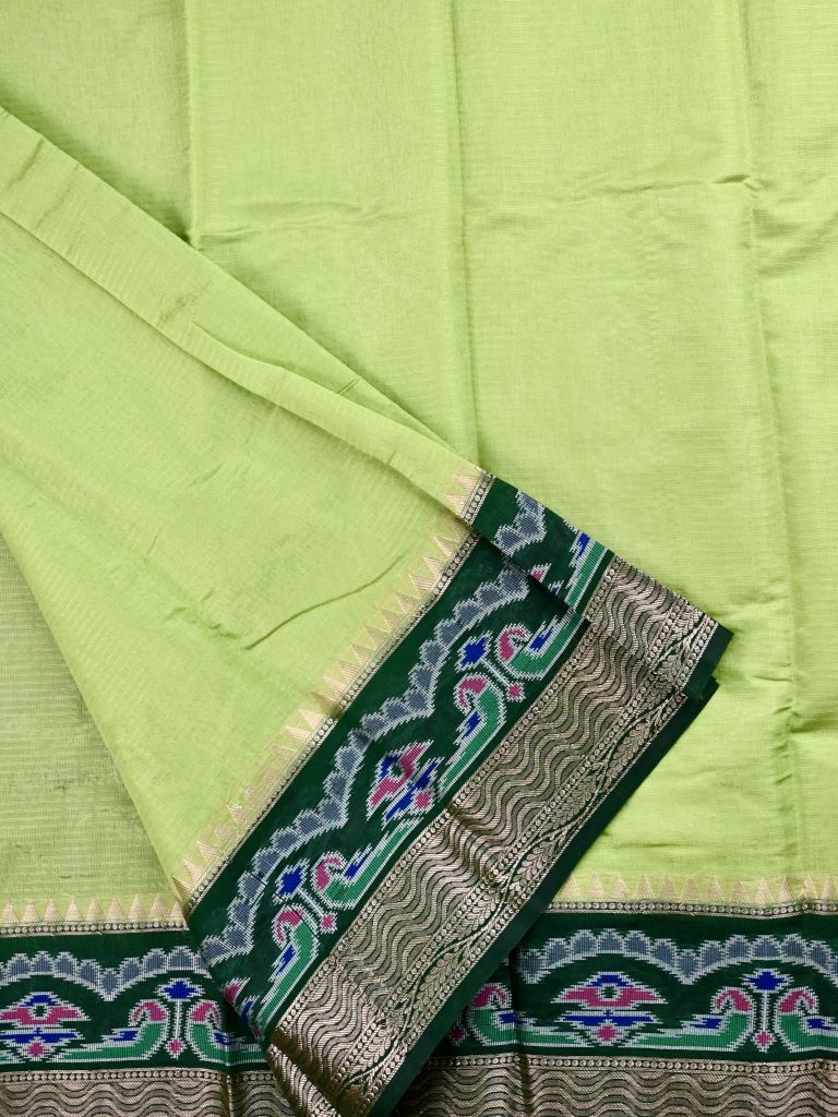 Dupion fancy saree light green color allover stripes & zari border with zari pallu and plain contrast blouse