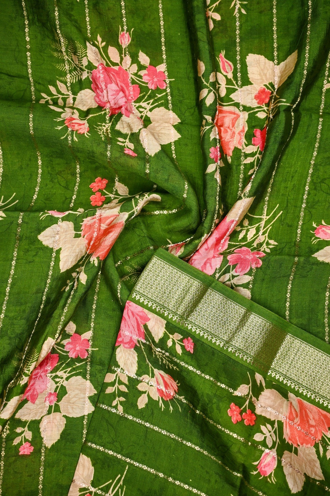 Maheshwari saree green color with allover digital floral prints with zari lines, short pallu, small zari border and blouse