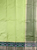 Dupion fancy saree light green color allover stripes & zari border with zari pallu and plain contrast blouse