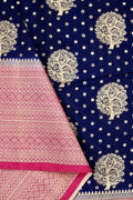 Banaras fancy saree navy blue and pink color with allover zari motive weaves, big zari border, pallu and plain blouse.