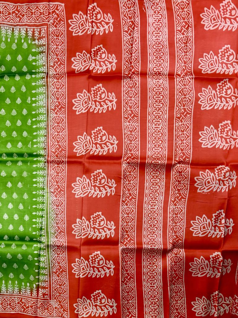 Pure silk fancy saree parrot green color allover prints & small printed border with contrast printed pallu and plain blouse