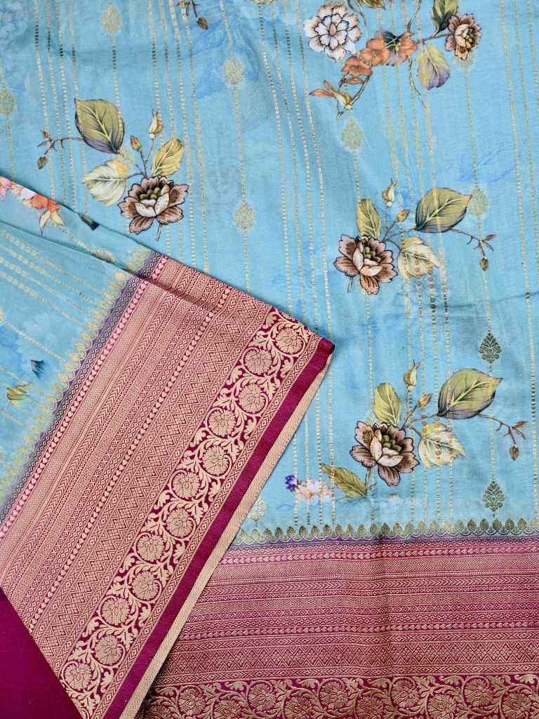 Banaras fancy saree sky blue color allover digital prints & zari border with brocade pallu and plain contrast blouse