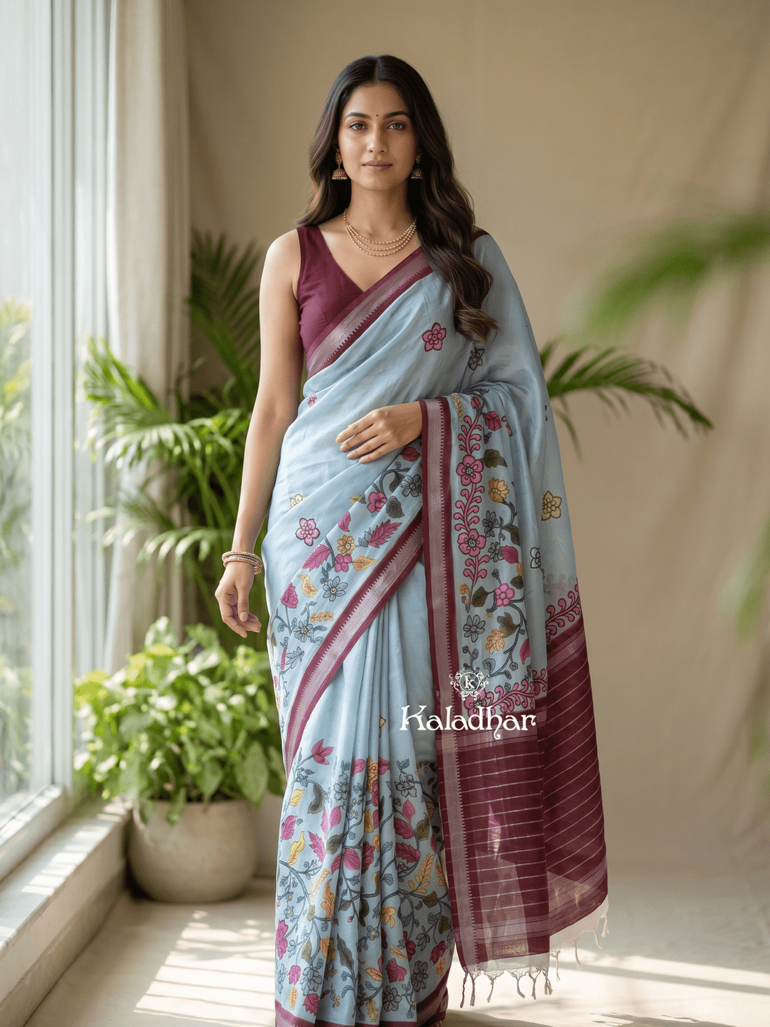 Mangalagiri fancy printed saree in light blue color with zari border and plain contrast blouse
