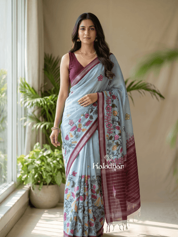 Mangalagiri fancy printed saree in light blue color with zari border and plain contrast blouse