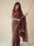 Mangalagiri fancy printed saree in maroon color with zari border and plain contrast blouse