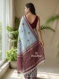Mangalagiri fancy printed saree in light blue color with zari border and plain contrast blouse