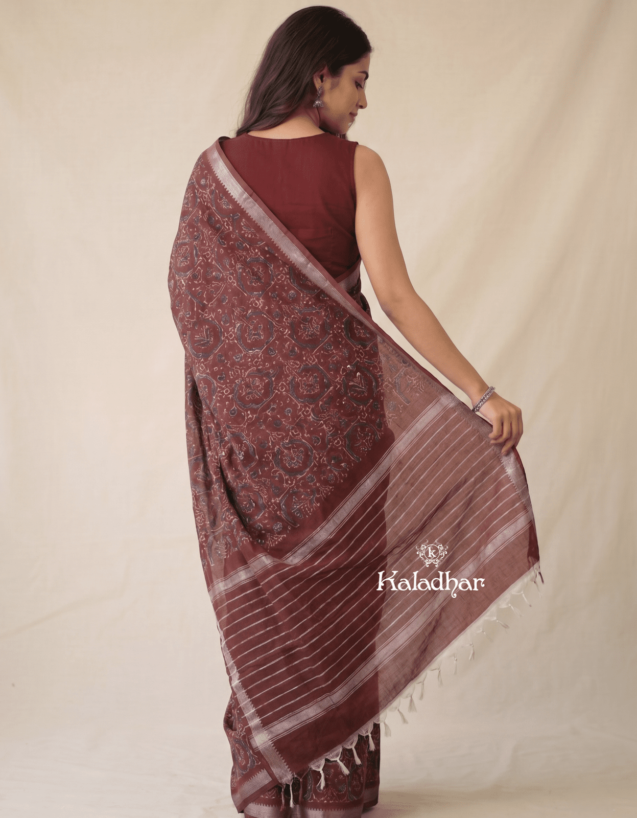 Mangalagiri fancy printed saree in maroon color with zari border and plain contrast blouse